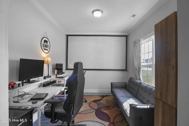 office with crown molding and baseboards
