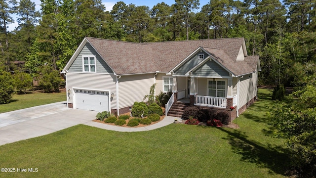 2312 Caracara Dr, New Bern, NC 28560 - view of front of property with covered porch, crawl space, driveway, and a garage