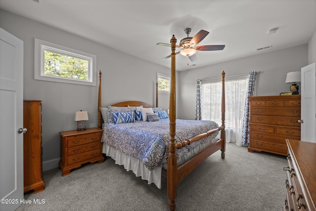 2312 Caracara Dr, New Bern, NC 28560 - bedroom with light colored carpet and ceiling fan