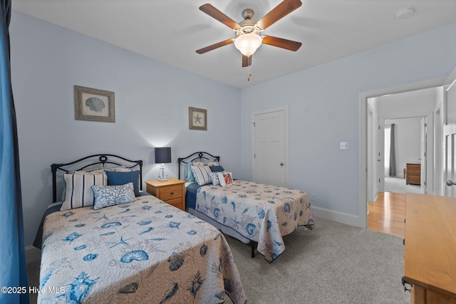 2312 Caracara Dr, New Bern, NC 28560 - carpeted bedroom with baseboards and ceiling fan