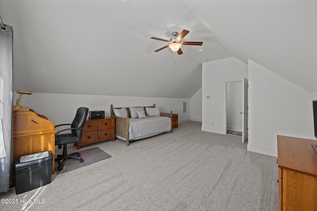 bedroom featuring vaulted ceiling, ceiling fan, carpet flooring, and baseboards