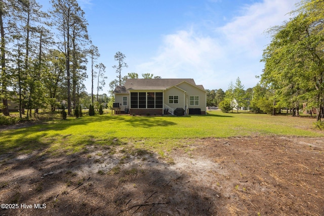 2312 Caracara Dr, New Bern, NC 28560 - back of property featuring a yard and crawl space
