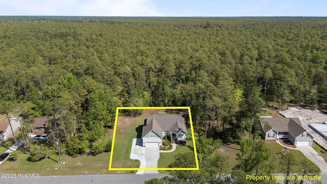 2312 Caracara Dr, New Bern, NC 28560 - aerial view of property and surrounding area with a forest and property boundaries highlighted