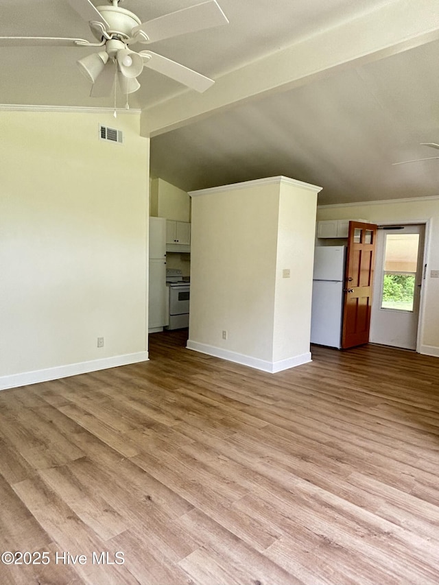 115 Cherry St, Woodland, NC 27897 - unfurnished living room with light wood-type flooring, visible vents, lofted ceiling with beams, and a ceiling fan