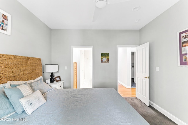 carpeted bedroom with baseboards
