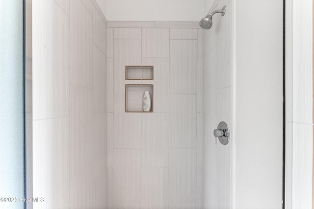 details with a tile shower