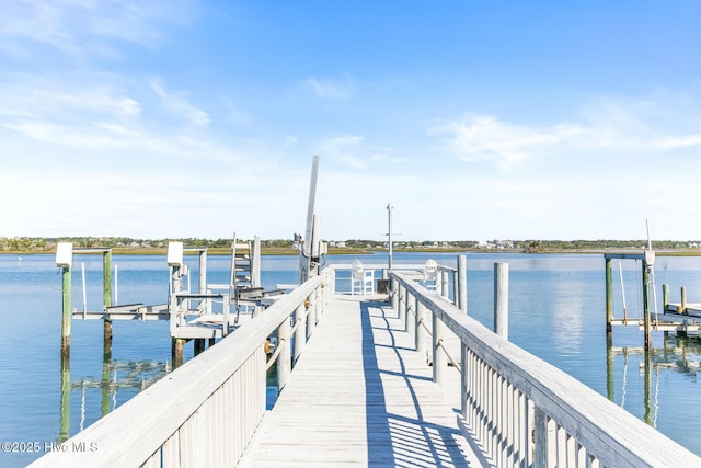 view of dock with a water view and boat lift