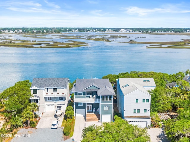 aerial view featuring a water view and a residential view