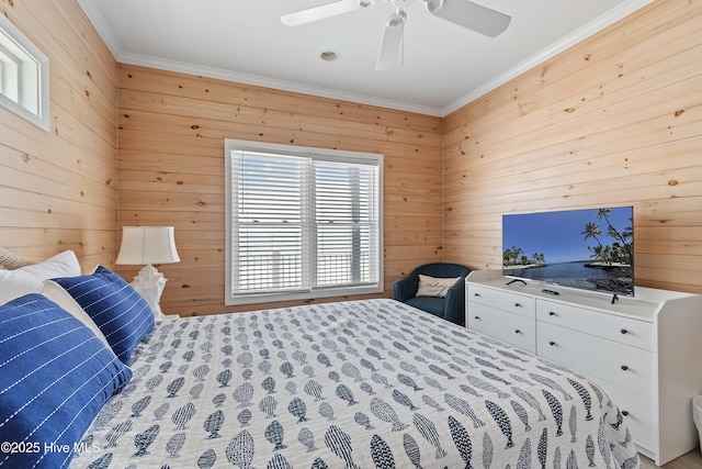 6621 W Beach Dr, Oak Island, NC 28465 - bedroom with ornamental molding, wooden walls, and ceiling fan