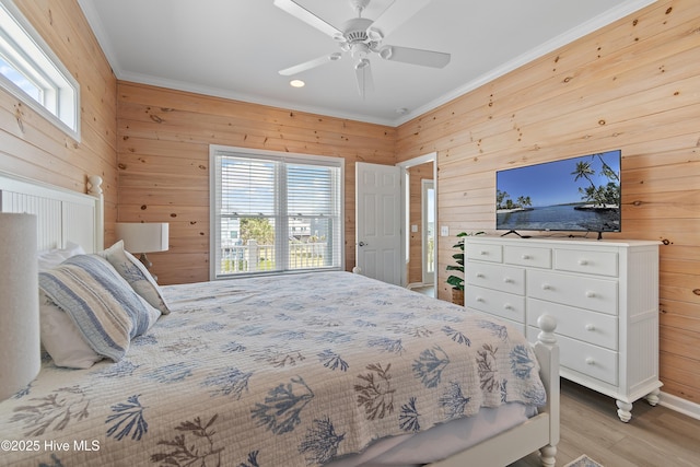 6621 W Beach Dr, Oak Island, NC 28465 - bedroom featuring wood walls, ornamental molding, wood finished floors, ceiling fan, and recessed lighting