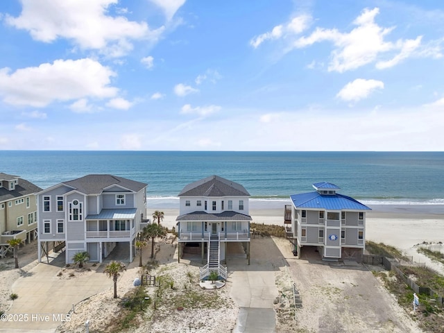 6621 W Beach Dr, Oak Island, NC 28465 - water view featuring local beach and stairs