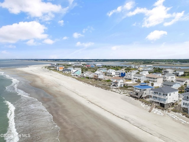 6621 W Beach Dr, Oak Island, NC 28465 - bird's eye view of waterfront with a beach