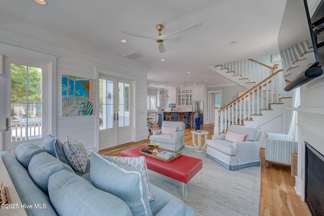 801 Federal Rd, Bald Head Island, NC 28461 - living room featuring stairs, light wood-style floors, a ceiling fan, and recessed lighting