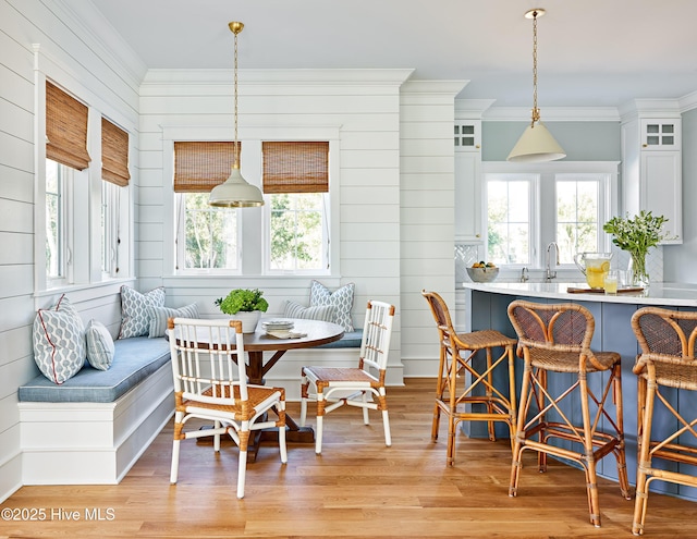 801 Federal Rd, Bald Head Island, NC 28461 - dining area featuring breakfast area, crown molding, and light wood finished floors
