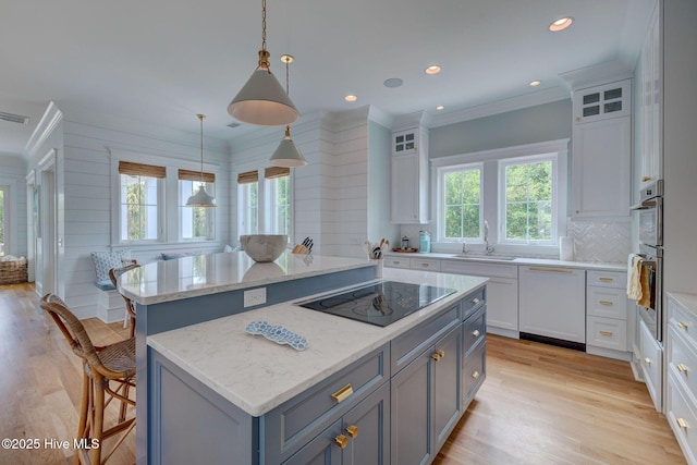 801 Federal Rd, Bald Head Island, NC 28461 - kitchen featuring black electric stovetop, a center island, dishwasher, a sink, and white cabinetry