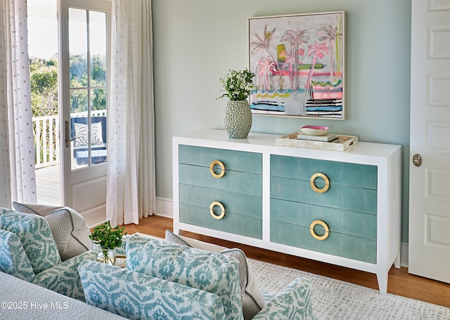 801 Federal Rd, Bald Head Island, NC 28461 - sitting room with healthy amount of natural light and wood finished floors