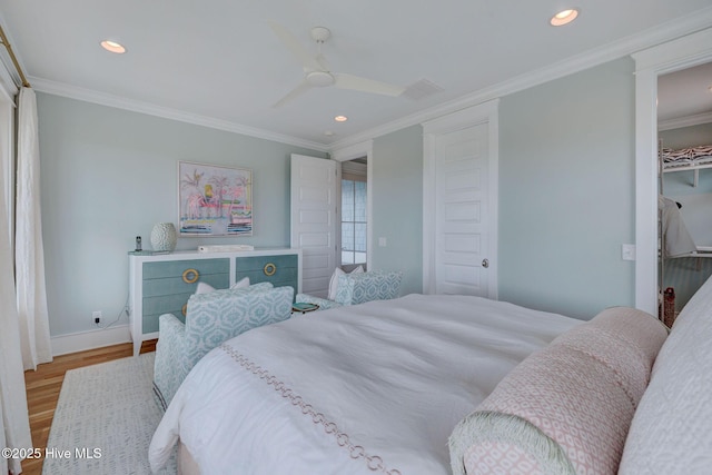 801 Federal Rd, Bald Head Island, NC 28461 - bedroom with wood finished floors, crown molding, recessed lighting, baseboards, and ceiling fan