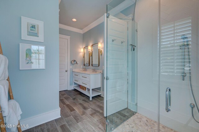 801 Federal Rd, Bald Head Island, NC 28461 - full bathroom with vanity, a stall shower, crown molding, wood finished floors, and baseboards