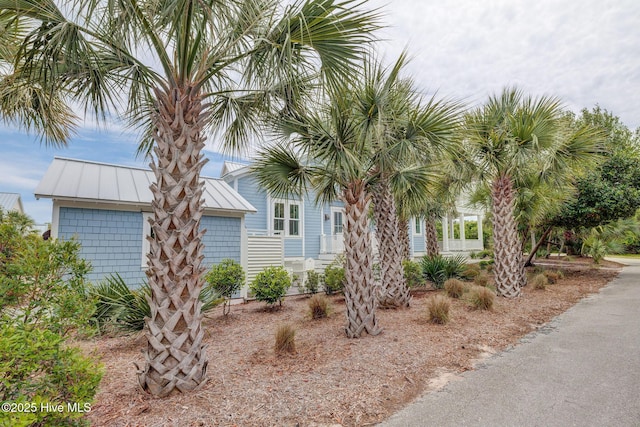 801 Federal Rd, Bald Head Island, NC 28461 - view of front facade featuring a standing seam roof and metal roof