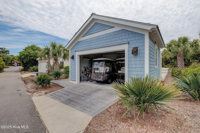 801 Federal Rd, Bald Head Island, NC 28461 - garage with concrete driveway