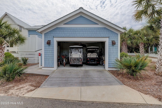 801 Federal Rd, Bald Head Island, NC 28461 - garage featuring concrete driveway