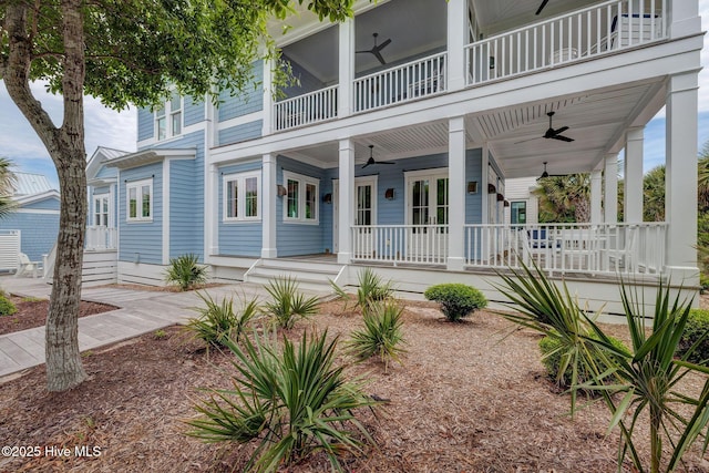 801 Federal Rd, Bald Head Island, NC 28461 - view of front of home with ceiling fan, a porch, and a balcony