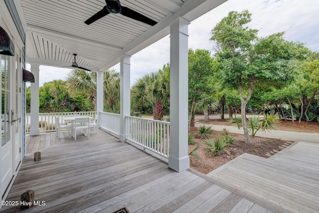 801 Federal Rd, Bald Head Island, NC 28461 - deck featuring a ceiling fan and outdoor dining area