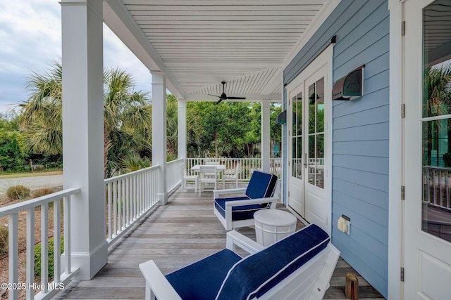 801 Federal Rd, Bald Head Island, NC 28461 - wooden porch with a ceiling fan
