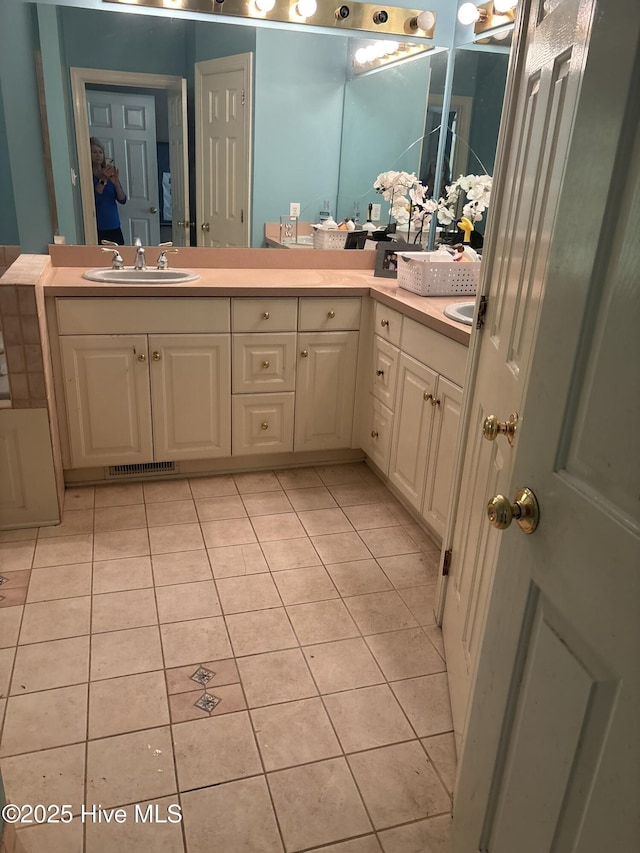2602 Linden Ln NW, Wilson, NC 27896 - bathroom with tile patterned flooring and double vanity