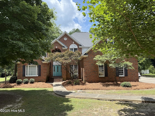 2602 Linden Ln NW, Wilson, NC 27896 - traditional home with a front yard and brick siding