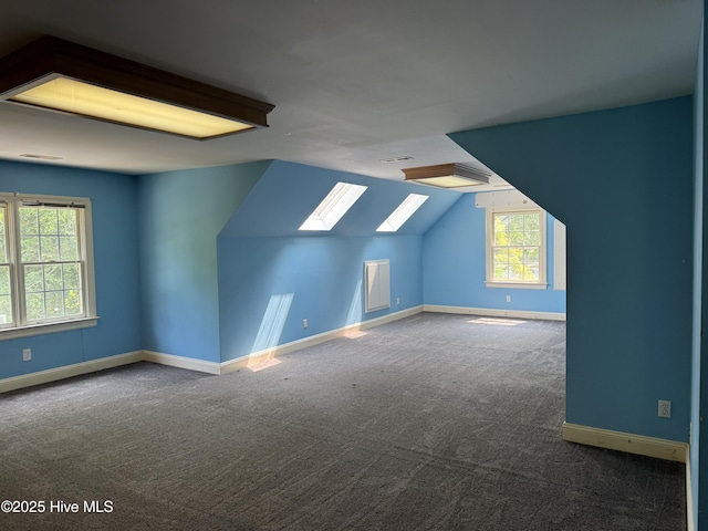 2602 Linden Ln NW, Wilson, NC 27896 - bonus room featuring a skylight, carpet floors, and lofted ceiling