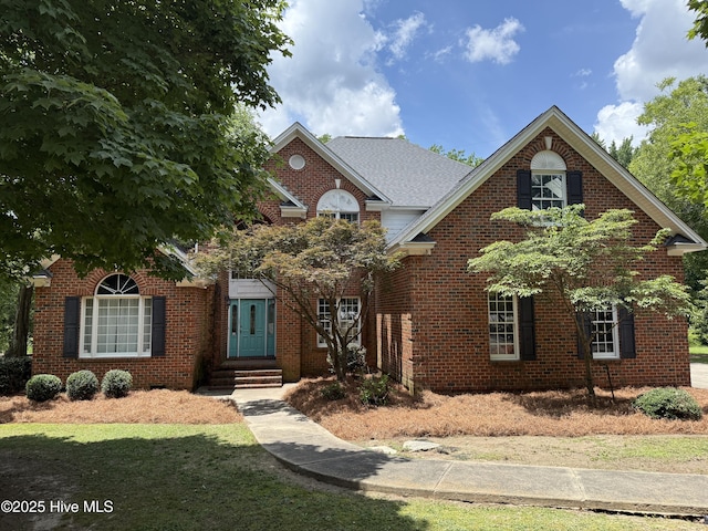 2602 Linden Ln NW, Wilson, NC 27896 - view of front facade with brick siding, entry steps, and a front lawn