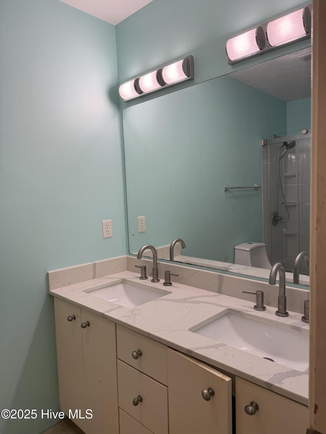 2602 Linden Ln NW, Wilson, NC 27896 - bathroom featuring double vanity and an enclosed shower