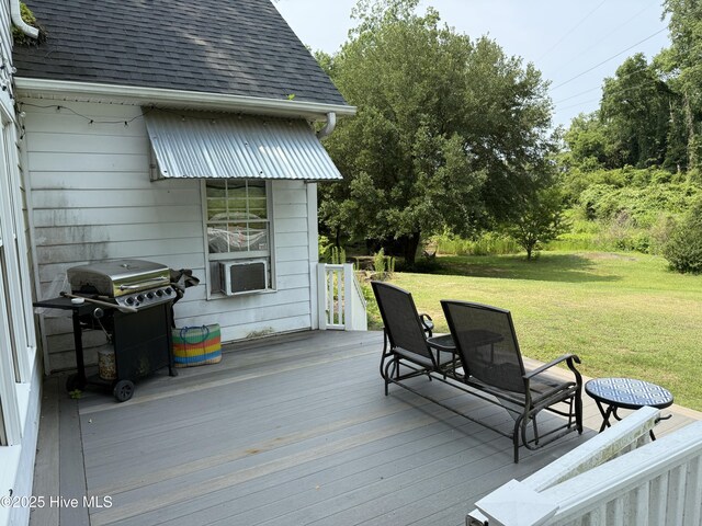 2602 Linden Ln NW, Wilson, NC 27896 - wooden deck featuring grilling area, a yard, and cooling unit