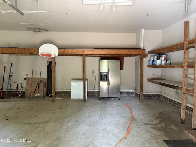 2602 Linden Ln NW, Wilson, NC 27896 - garage with stainless steel fridge