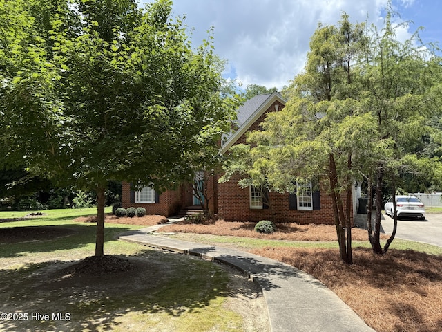2602 Linden Ln NW, Wilson, NC 27896 - obstructed view of property featuring brick siding and a front yard