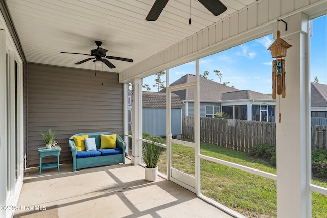 506 Esthwaite Dr SE, Leland, NC 28451 - unfurnished sunroom with a ceiling fan