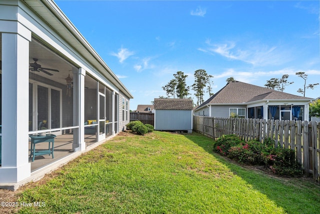 506 Esthwaite Dr SE, Leland, NC 28451 - view of yard with a sunroom and a ceiling fan