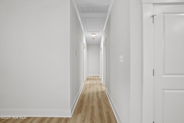 1064 Tulls Creek Rd, Moyock, NC 27958 - corridor featuring attic access, light wood-type flooring, and baseboards