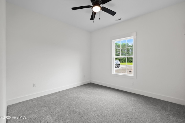 1064 Tulls Creek Rd, Moyock, NC 27958 - carpeted spare room with baseboards and a ceiling fan