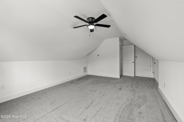 1064 Tulls Creek Rd, Moyock, NC 27958 - bonus room featuring carpet, lofted ceiling, ceiling fan, and baseboards