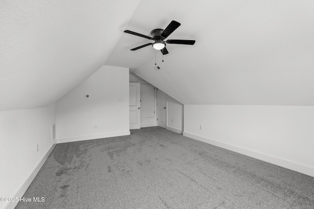 1064 Tulls Creek Rd, Moyock, NC 27958 - bonus room with carpet flooring, lofted ceiling, baseboards, and a ceiling fan