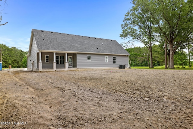 1064 Tulls Creek Rd, Moyock, NC 27958 - rear view of property featuring central AC and a shingled roof