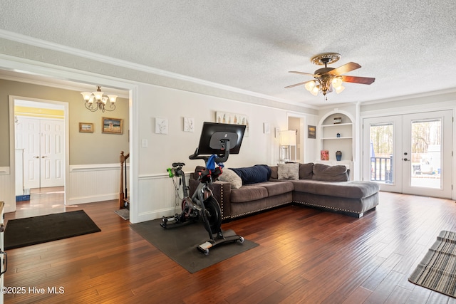 1714 Darian Dr, Elizabeth City, NC 27909 - living area with ceiling fan with notable chandelier, a textured ceiling, ornamental molding, and dark wood finished floors