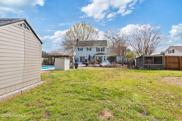 1714 Darian Dr, Elizabeth City, NC 27909 - exterior space with a fenced in pool, a sunroom, and fence