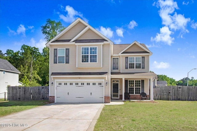 - craftsman house featuring brick siding, an attached garage, driveway, and a front yard