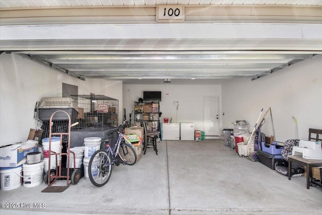  - garage featuring fridge