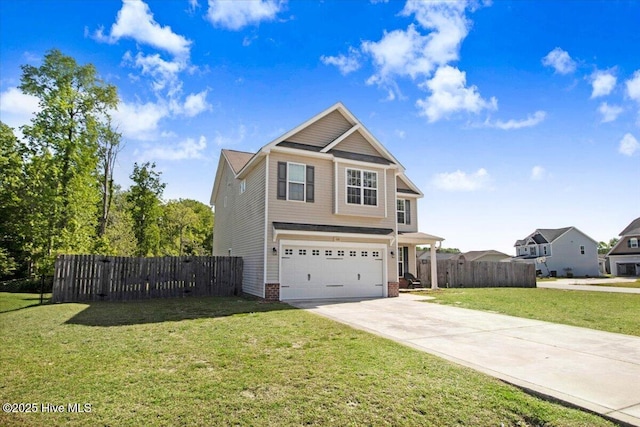  - view of front of home featuring an attached garage, driveway, fence, and a front yard