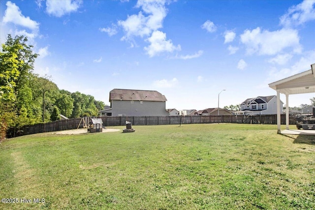 - view of yard with a patio area and a fenced backyard
