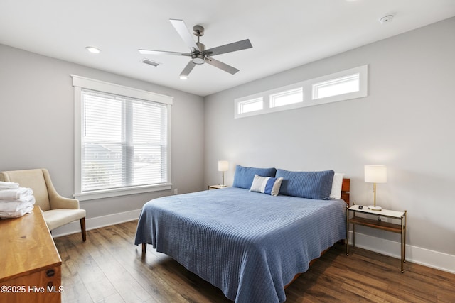bedroom with ceiling fan, recessed lighting, baseboards, wood finished floors, and visible vents